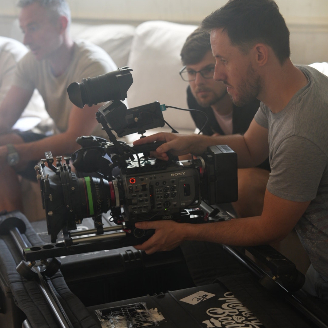 Men Using Video Camera Men Using Video Camera